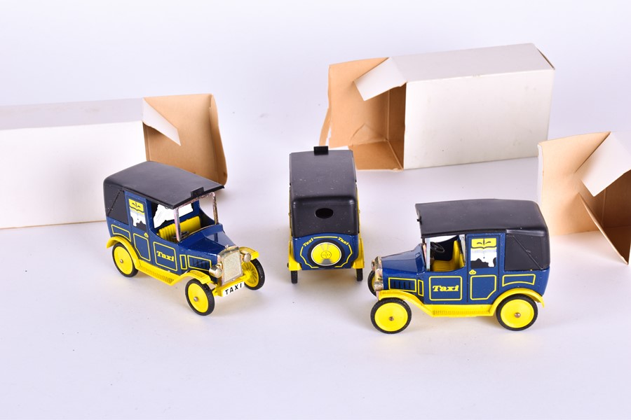 A collection of 57 boxed Dinky Toys Taxi models each modelled in blue and yellow, cast to the - Image 10 of 12