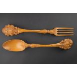 A pair of Victorian boxwood salad servers carved with the Royal Albert Hall crest, with label