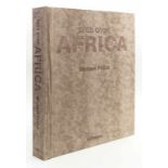 Poliza, MichaelFotobuch "Eyes over Africa". Edition, Stempel "Printed Sample" Version.