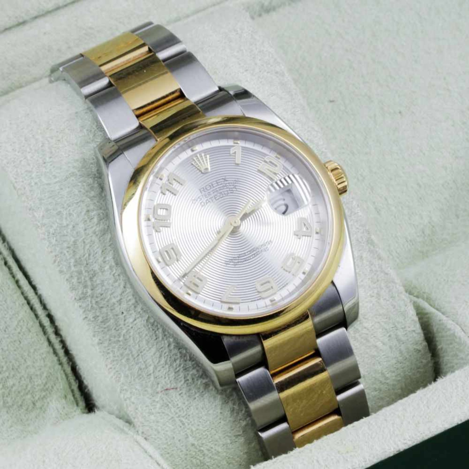 Herrenarmbanduhr "Rolex Oyster Perpetual DATE JUST".Gehäuse und Ansatzband mit Faltschließe aus