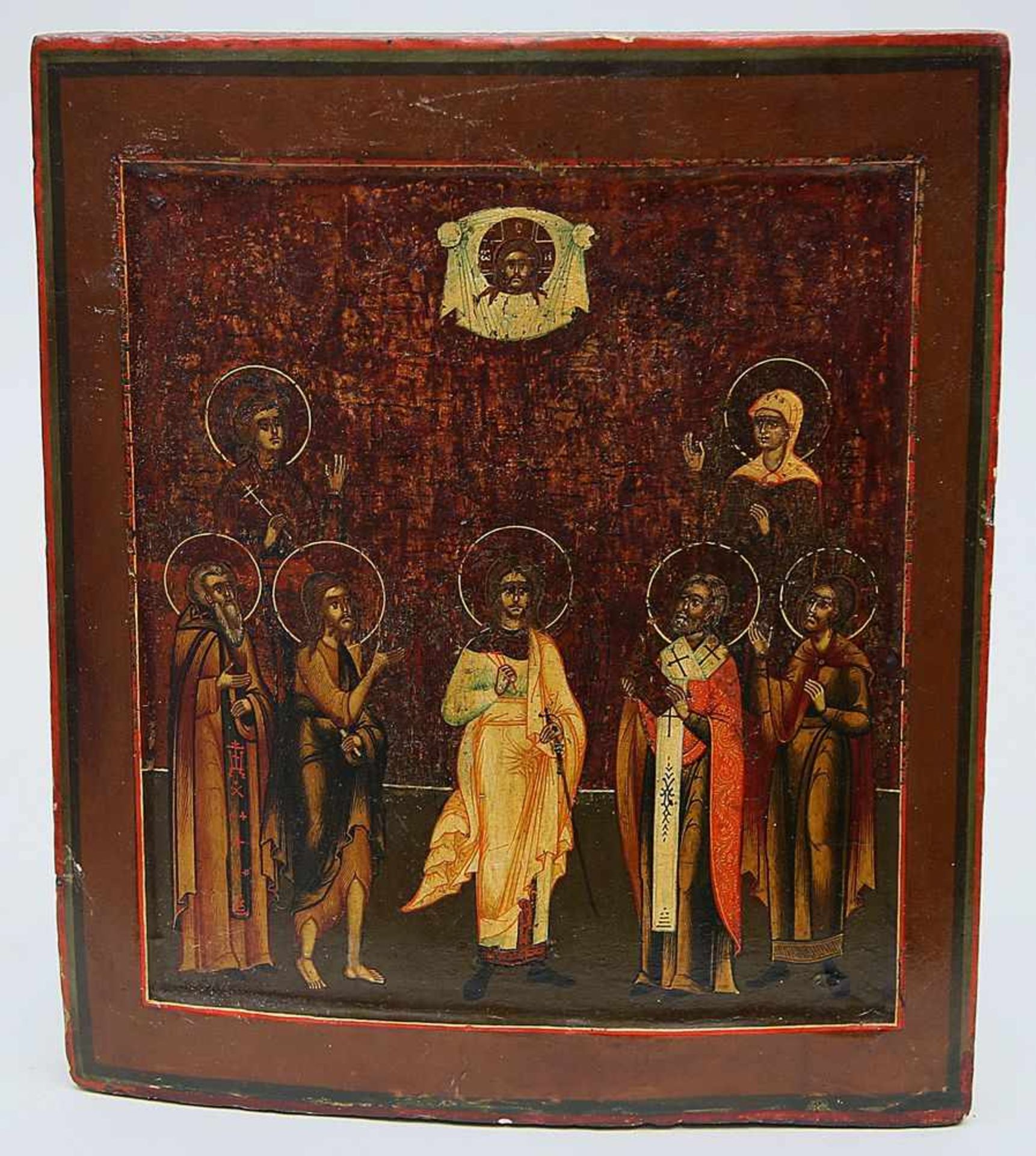 Ikone (Russland, 19. Jh.)Gruppe stehender Heiliger, darüber Antlitz Christi. Tempera/Holz.