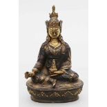 Padmasambhava.Kupferfarbene Bronzelegierung, teils mit Feuervergoldung. Der Lotoshut mit