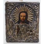 Ikone (Russland, Ende 19. Jh.)"Christus Pantokrator". Tempera/Holz mit versilbertem Metalloklad. Nur