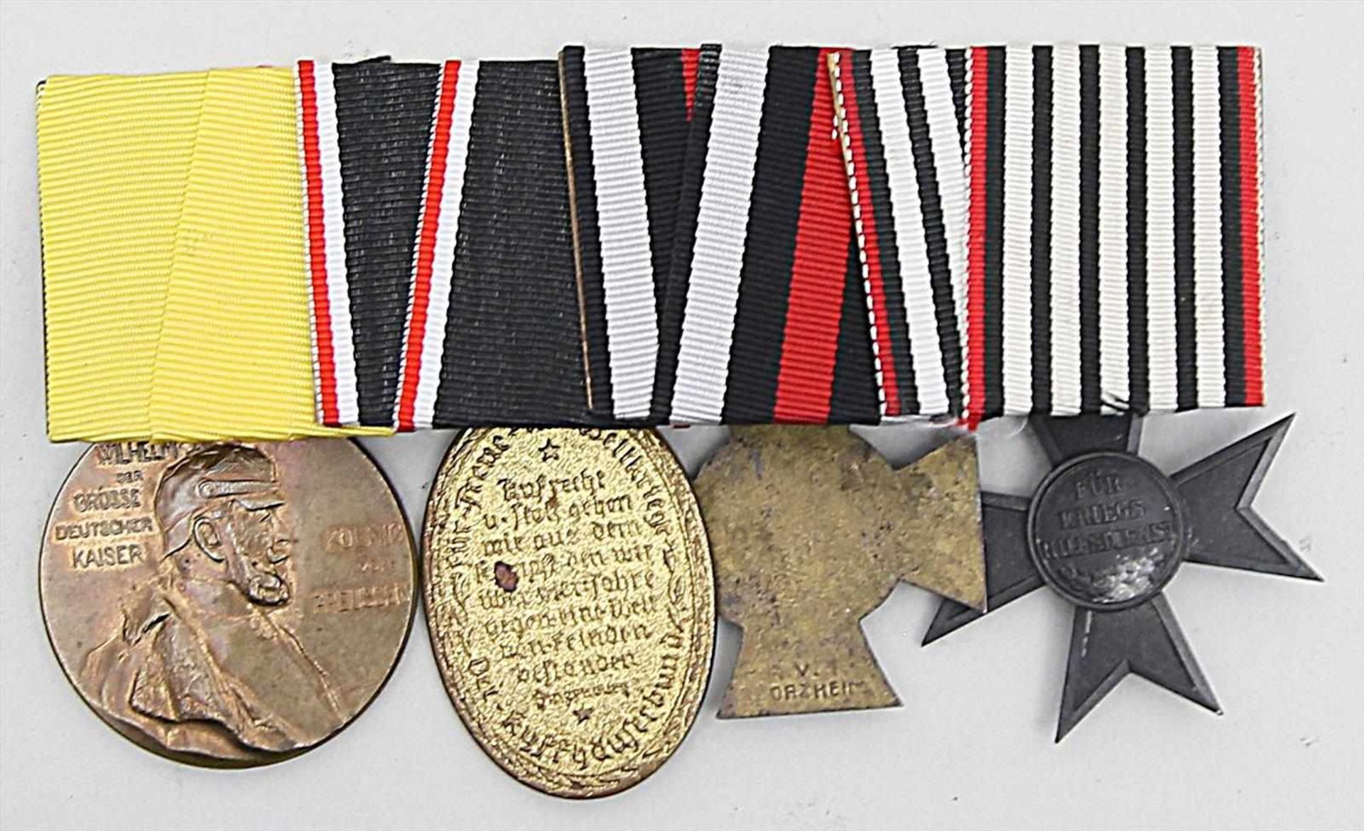 Ordensspange mit 4 Auszeichnungen:Ehrenkreuz für Frontkämpfer, Erinnerungsmedaille Wilhelm I, "