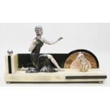 Art Deco-Skulpturengruppe:Kniende Dame mit Hund. Verschiedenfarbig patiniertes Metall, Onyx und