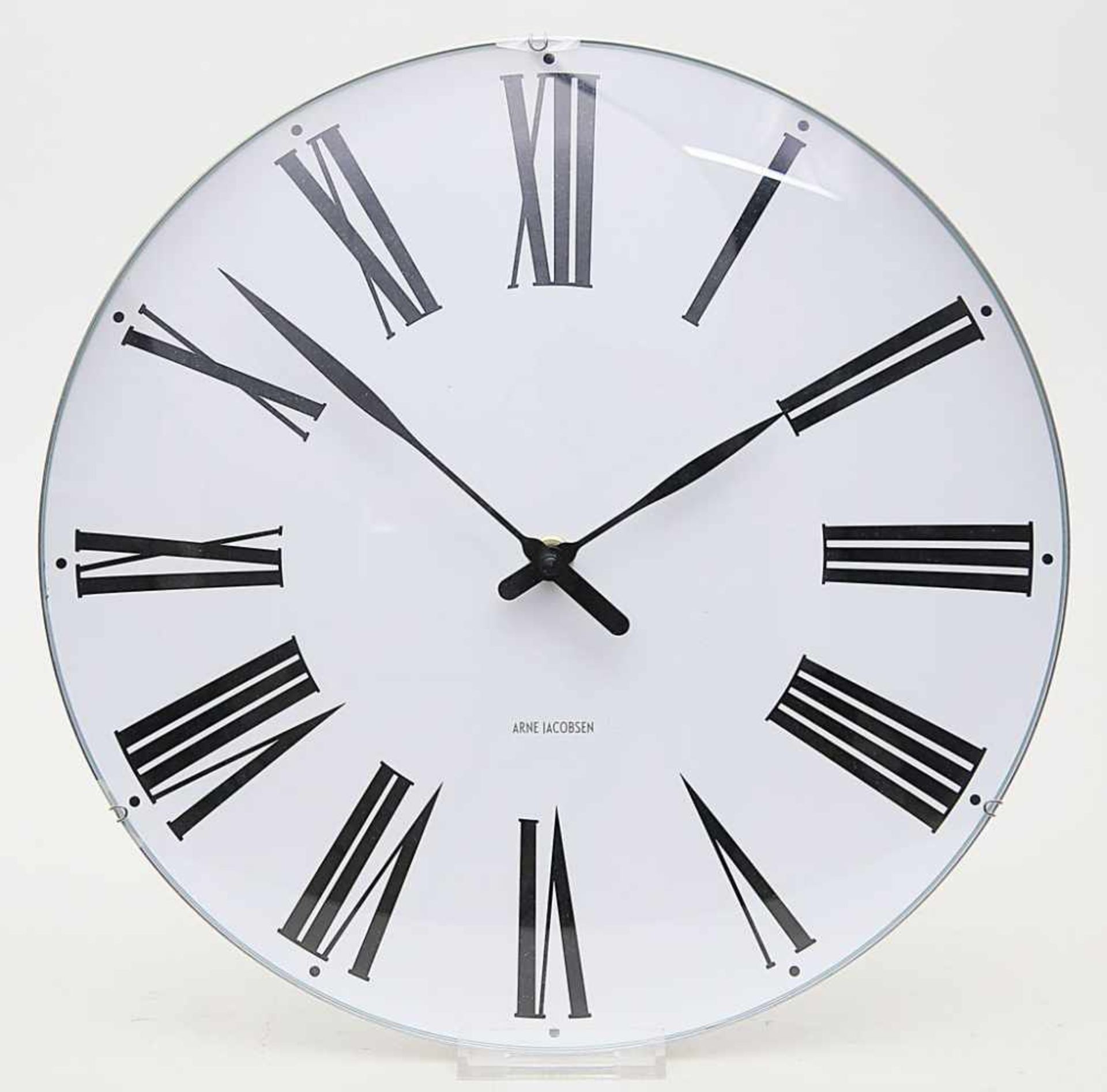 Jacobsen, Arne (1902 Kopenhagen 1971)Wanduhr "Roman Clock" aus Aluminium und Glas. Guter,