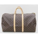 Reisetasche, Louis Vuitton.Braunes Monogram-Canvas mit goldfarbenen Beschlägen. Besätze aus