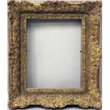 Impressionistenrahmen.Stuck, vergoldet (best./l. rep.). Falzmaß 40x 32 cm, Rahmenbreite 10 cm.- - -