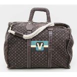 Tasche, Louis Vuitton.Linie "Monogram Idylle", gedrucktes V in Weiß, Schwarz und Türkis. Brauner