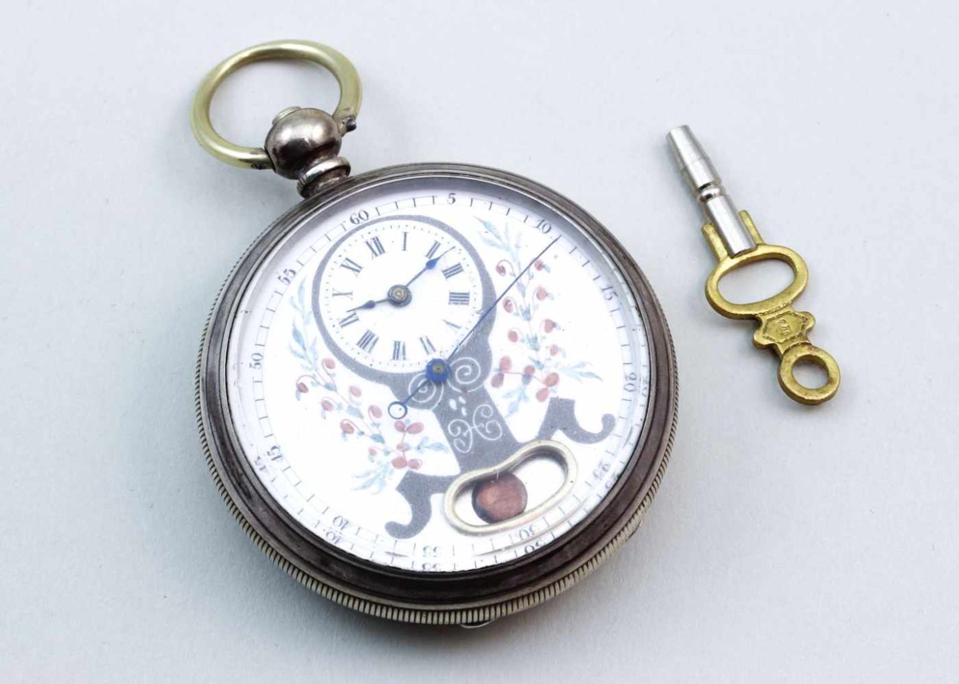 Schlüsseltaschenuhr mit "Automat".Fine Silver-Gehäuse mit guillochiertem Deckel und gravierter