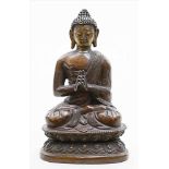 Sitzender Buddha.Kupferbronze, das Gesicht kaltvergoldet. Figur des auf dem Lotosthron im