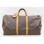 Tasche "Keepall 60", Louis Vuitton.Monogram-Canvas mit Lederbeschlägen. Gem. SA 851, made in France.