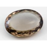 Großer Rauchquarz, ca. 460 ct.Oval facettiert. L. best. und kl. Kratzer. Ca. 5x 6,8x 1,7 cm.- - -