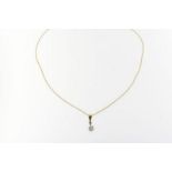 Geelgouden collier waaraan in zilver bolsjewiek diamant ca. 0.60ct.A yellow gold necklace