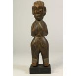 Houten gestoken Bobo sculptuur van vrouwenlijk staand figuur, Burkina Faso, h. 32 cm.Wooden carved