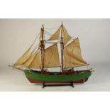 Houten modelschip met 2 masten, h. 50 cm.