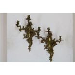 Stel bronzen 3-lichts Louis XV-stijl wandappliques, h. 50 cm.