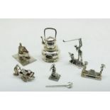 Lot van 6 zilveren miniaturen, w.o. kaasdragers, bouilloir op comfor, holl. kl.keur, gew. 183gr.