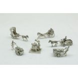 Lot zilveren miniaturen waarbij koets, gew. 127gr. div.kwal.Lot silver miniatures, weight 127 gr.