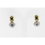 Bicolor gouden oorstekers bezet met diamant briljantslijpsel ca. 0.85ct. geh. 750/000A pair of white