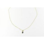 Gouden collier waaraan hanger bezet met diamant en saffier geh.585/000A gold necklace with pendant