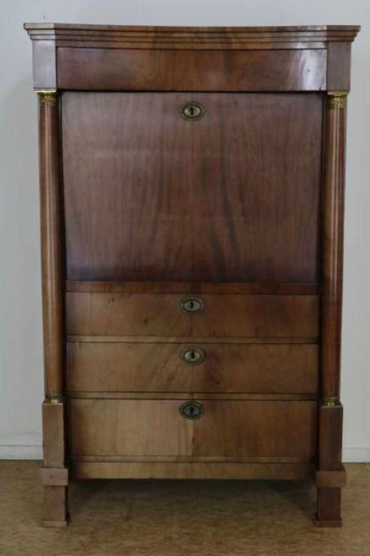 Mahonie Empire secretaire met lade en schrijfklep waarachter interieur en waaronder 3 laden,