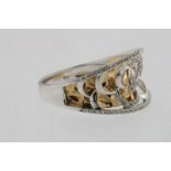 Bicolor gouden ring bezet met diamant, geh. 585/000