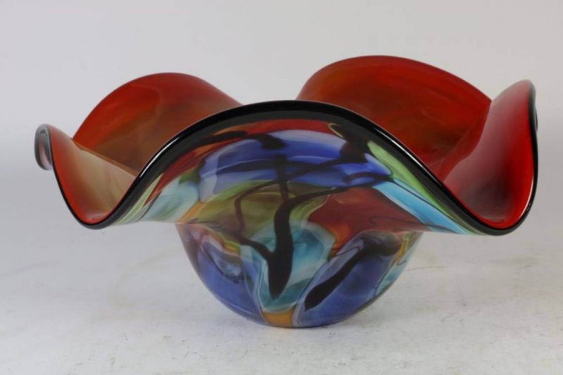 Polychroom dik glazen fruitschaal, h. 20 cm. diam. 43 cm. Polychrome glass fruit bowl, h. 20 cm.