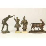 Lot van 2 bronzen sculpturen van man en vrouw, bronzen sculptuur van mijnwerker en een zamak koe bij