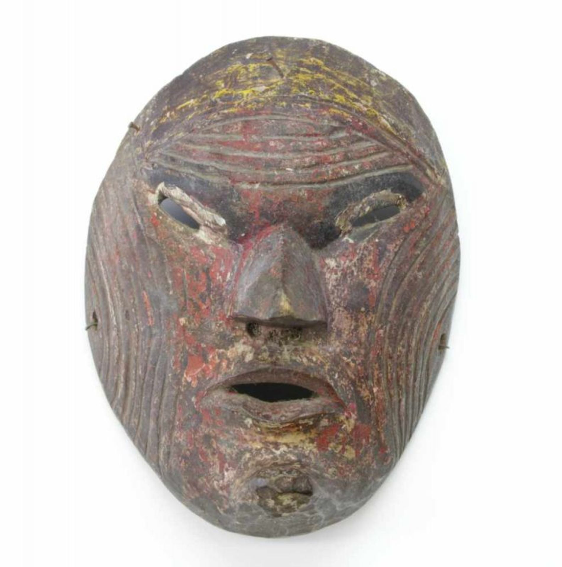 Java, Topeng mask, with carved lines and weathered polychromyl. 19 cm.; [1]200,00