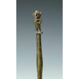 Peru, two metal ritual axes, tumi,with relief decoration of animals and surmounted by standing