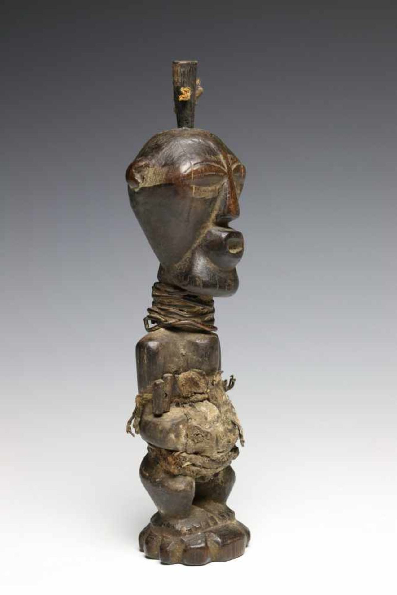 DRC., Songhe, small power figure,with horn, copper threads, animal skin and black offering