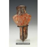 Near Eastern antique terracotta idol,in anthropomorphic form with raised arms. WIth red to black
