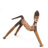 PNG, Papua Golf, wooden neckrest, ira'ao,anthropomorph-zoomorphic form. With red, white and black