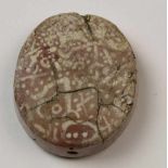 Etched agate disc shaped bead, possibly Mohenjo Daro, Paikstan, 2500-1500 BC.with etched line