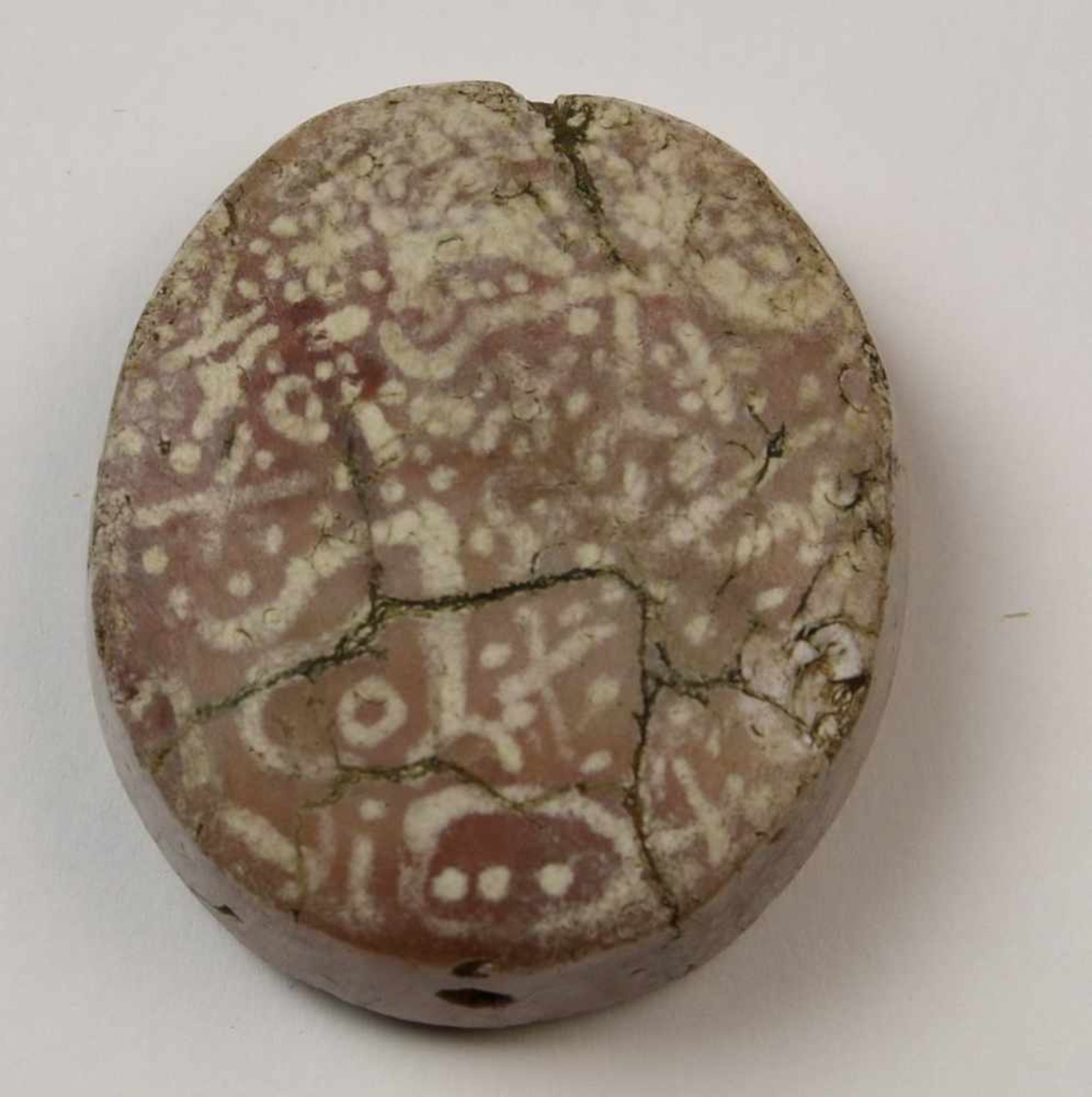 Etched agate disc shaped bead, possibly Mohenjo Daro, Paikstan, 2500-1500 BC.with etched line