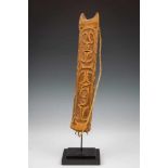 PNG, Sepik, bamboo spear thrower, wooden pounder and Asmatopen worked wooden panel with