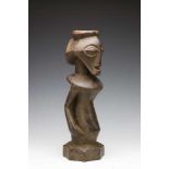 DRC., Bembe, half figure,with hole in head, beard, indentations round the shoulders and a base