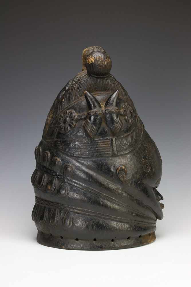 Sierra Leone, Mende, helmetmask, sowei,with three braids ending in and on the side carved flower - Image 2 of 5
