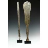 Ngombe, excecutioner sword and Yaka, sword.on metal stands. ; h. 60 cm.; Provenance collection L. C.