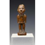 DRC, Bakongo, fine miniature powerfigure, ca. 1880-1900,with forward placed head, protruding lips,