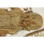 West Papua, Asmat, yipai, braided ceremonial costume, raffia skirt and arm extensionsl. 87 cm. ex.