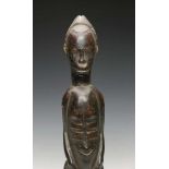 Ivory Coast, Baule, standing male figure,with scarifications at the neck, back, face and belly. With