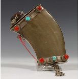 Tibet, powder horn, 19th century. Silver, wood, leather, horn, turquoise and coral.Opens at two