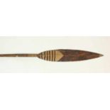 PNG, Kominimum, ceremonial paddle, painted in natural dyewith three star-shaped motifs, concentric