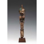 PNG, Middle Sepik, Iatmul-Sawos, standing female figure, flute stopperWith slightly tilted left