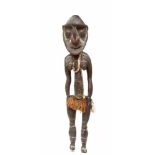 Middle Sepik, Kwoma, standing female figure,with expressive facial traits and painted patterns in
