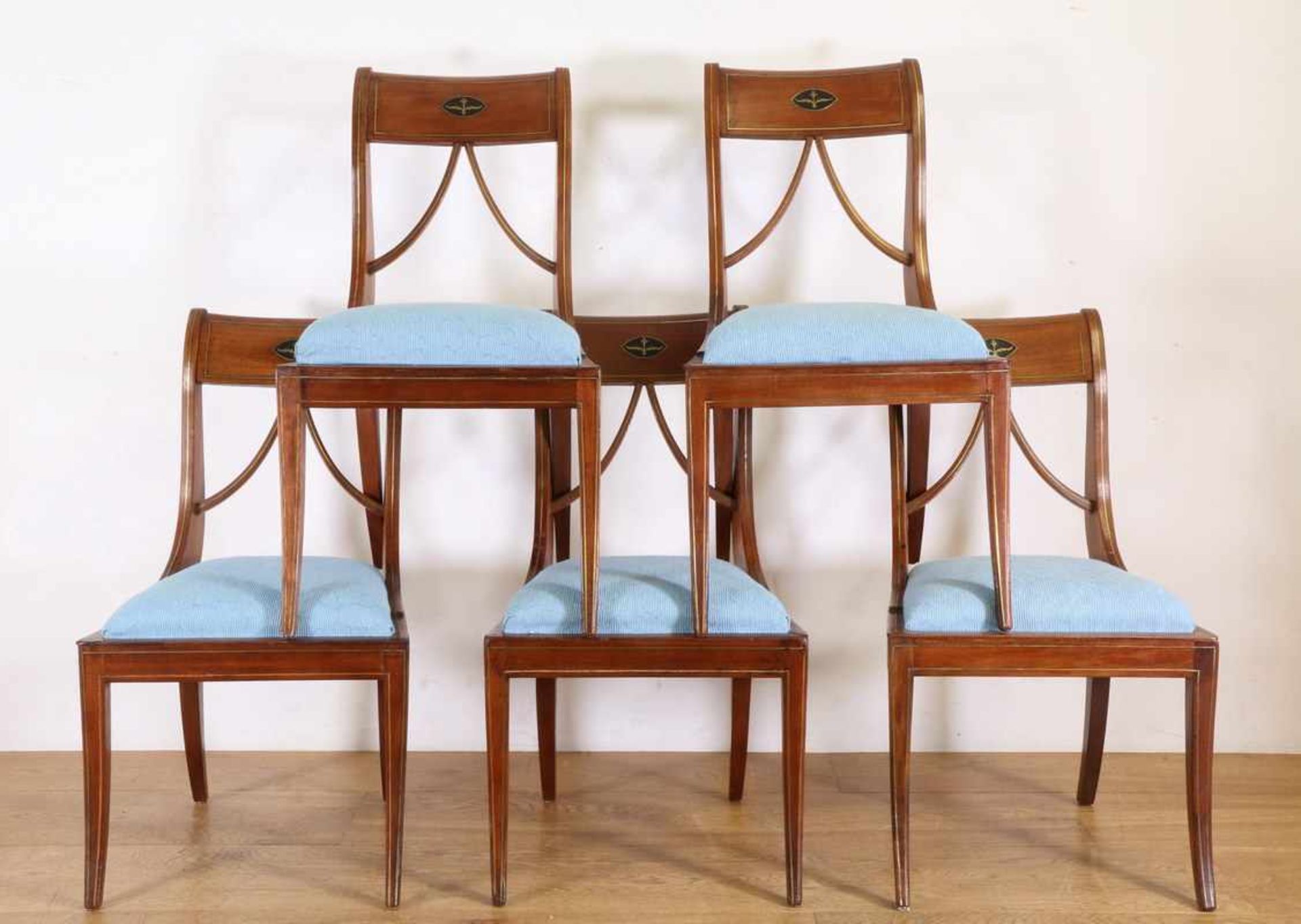Set van vijf mahoniehouten stoelen, Empire, ca. 1800,In de kapregel een ruitvorm waarin een zwart
