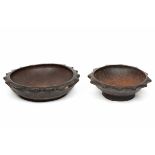 Philippines, two wooden Ifugao bowls, with radiating rimbrown-blackish patina; d. 38,5 and 46 cm.;