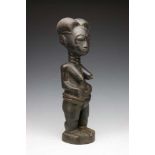 Two African wooden female figures.; h. 35 and 41 cm.; 2200